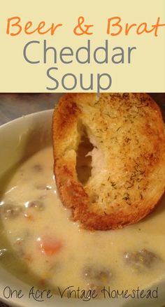 a close up of a bowl of soup with bread on the side and text overlay reading beer and brat cheddar soup