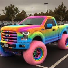 a truck with rainbow paint on it's tires