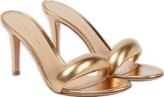 Sleek Gold Sandals With Single Toe Strap, Sleek Gold Leather Heels, Sleek Gold Sandals With Pointed Toe, Sleek Gold Sandals With Sculpted Heel, Elegant Gold Slides For Spring, Elegant Gold Open Toe Slides, Luxury Gold Mules With Padded Heel, Luxury Metallic Open Toe Mules, Chic Gold Open Toe Slides