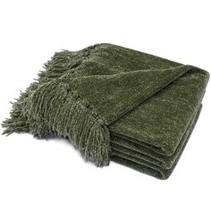 a green blanket folded on top of each other