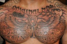 a man with tattoos on his chest has an egyptian cross and an an an an an