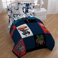 a bed in a room with a spiderman comforter