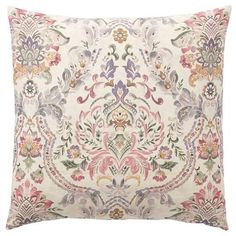 a decorative pillow with an ornate design on the front and back, made from linen