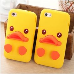 two yellow ducky cases sitting next to each other