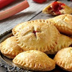 several small pies are on a plate