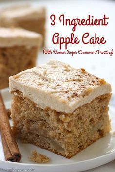 three ingredient apple cake with brown sugar cinnamon frosting on a white plate next to two cinnamon sticks