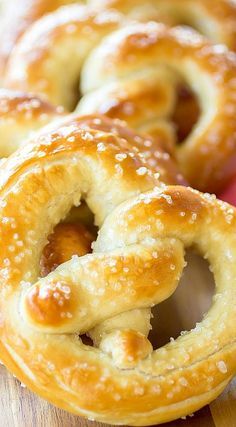 several pretzels sitting on top of a wooden table