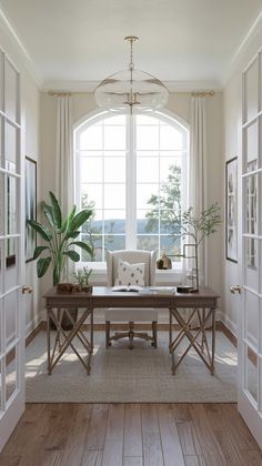 a living room filled with furniture and a large window