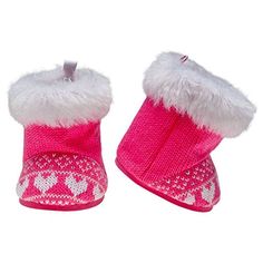 a pair of pink and white knitted slippers