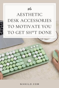 a person typing on a computer keyboard with the text, 26 aesthetic desk accessories to motivitate you to get sht done