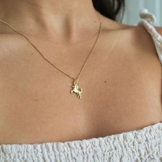 "14K Gold Horse Pendant, 14K Solid Gold Horse Necklace Charm, 14K Gold Horse Necklace Charm, A gift to Horse Riders, 14K Dainty Horse Pendant, Can be worn with other necklaces, great for layers. A Perfect 14K Gold gift. . . . * Pendants Measurements With Bail: (23 x13 mm) * Chain is included ( 1MM Box Chain) * Stamp: Real 14k Gold * Never gold filled or plated * Packaged With Free Gift Box . . . If you have any questions, just hit the \"Message the Seller\" button ( bottom right of the page) and Gold 14k Hallmarked Charm Necklaces, 14k Gold Charm Necklace With Hallmark, 14k Gold Charm Necklace, Yellow Gold Charm Necklaces With Hallmark For Gifts, Yellow Gold Charm Necklaces With Hallmark As Gift, Yellow Gold Hallmark Charm Necklace As Gift, Dainty Yellow Gold Charm Necklace With Hallmark, Horse Pendant, Horse Christmas Gifts