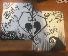 two halloween cards on a table with black and white designs