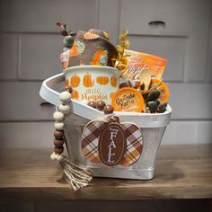 This cozy, fall- themed home gift basket could be perfect for someone who just closed on a new home or bring it as a Thanksgiving host gift. It includes warm fall colors like rusty orange and burgundy. This gift basket includes:  * a reusable small chip  basket  * "Hello Pumpkin" coffee mug  * "Happy Fall" small sign decor  * 2 pairs of Fall Themed Socks * 2 packets of Spice Apple Cider * 2 Pumpkin Latte Coffee Pods *  Small petite wood spoon This fall gift basket will come wrapped in tulle/ shr Spice Apple Cider, Hostess Basket, Guest Welcome Baskets, Home Gift Basket, Thanksgiving Care Package, Chip Basket, Welcome Gift Basket, Thanksgiving Host Gift, Thanksgiving Host