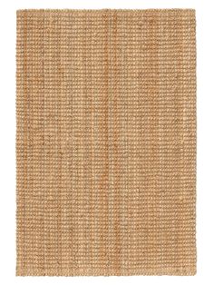 an area rug made out of jute and woven with natural fibers on the bottom