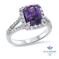 Beautiful purple sapphire center stone with diamond halo and diamond studded band - a one of a kind, non traditional engagement ring! The perfect pop of color for when you decide to pop the question Perfect as an engagement ring or anniversary present! This one of a kind purple sapphire ring is surrounded by a sparkling diamond halo and accompanied with a diamond studded split shank band. It's an elegant and truly one of a kind, non traditional engagement ring that packs a gorgeous punch of colo Purple Sapphire Zales, Engagement Rings With Purple, Purple Cushion Cut Brilliant Ring, Purple Brilliant Cushion Cut Rings, Purple Diamond Ring With Halo Setting For Promise, Purple Sapphire Ring With Halo Setting For Promise, Purple Diamond Halo Ring, Purple Diamond Rings With Halo Design, Purple Sapphire Ring With Halo Setting