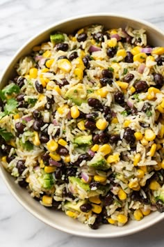 a bowl filled with rice and black beans