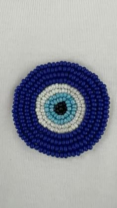 #aesthetic #blue #diy Evil Eye Bead Embroidery, Olive Beaded Embroidery, Red Bead Embroidery, Pearl Bead Embroidery, Evil Eye Embroidery Pattern, Beading Embroidery Patterns, Easy Bead Embroidery Patterns, Simple Beaded Embroidery, Embroidery Beads Tshirt