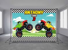 an image of two monster trucks in the middle of a room with checkered walls