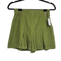 Urban Outfitters Womens Bdg Green Pleated Corduroy Mini Skirt Size Xs Nwt Urban Outfitters Bdg Pleated Corduroy Mini Skirt In Green. Side Zip Closure. Corduroy Material. No Stains Or Holes. Casual Grunge Y2k Corduroy Pleated Mini Skirt. Size: Xs Length: 13.25" Waist: 12.5" Condition: New With Tag Box D K/12/13pmerd High Waist Cotton Skort With Pleated Skirt, Green Corduroy Bottoms For Summer, Green Cotton Skort For Spring, Chic Cotton Bottoms By Urban Outfitters, Chic Cotton Bottoms From Urban Outfitters, Fitted Corduroy Bottoms For Summer, Urban Outfitters Cotton Shorts For Spring, Corduroy Mini Bottoms For Spring, Trendy Green Cotton Skort