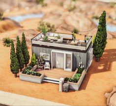 a model of a house in the desert with trees and plants on top of it