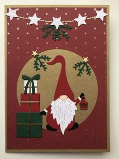 a christmas card with a santa clause and presents on the front, surrounded by stars