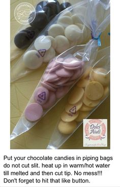 an image of some pink and white candies in a plastic bag on top of a table