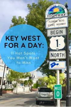 a blue circle with the words key west for a day on it and street signs