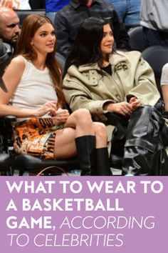 two women sitting next to each other at a basketball game with text overlay that reads, what to wear to a basketball game, according to celebrate