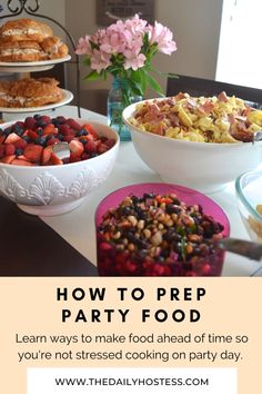 a table topped with bowls of food next to plates of fruit and muffins