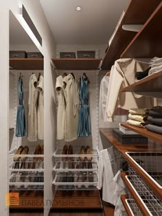 an organized closet with clothes and shoes