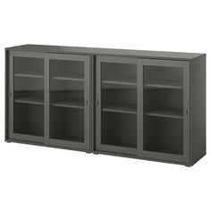 a large gray cabinet with glass doors on the front and bottom shelves in different sizes