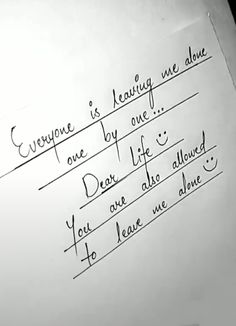 handwriting written on white paper with black ink and writing underneath the words everyone is leaving we dou one by one