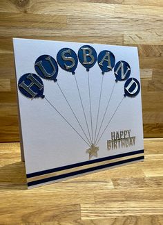 a birthday card with balloons that say husband