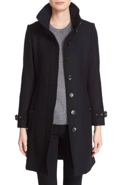 UP FOR SALE IS A "BURBERRY GIBBSMOORE WOOL BLEND BELTED COAT".  RETAIL AT $1095 PLUS TAX.  IT IS NICELY HUNG INSIDE A GARMENT BAG, UNTOUCHED BY ANYONE.  IT IS SUPER SUPER SUPER ELEGANT, TIMELESS AND CLASSIC COAT!!!  - IF YOU ARE INTERESTED, PLEASE GIVE ME A REASONABLE OFFER.  OFFER HAS TO BE *** EXTREMELY CLOSE *** TO ASKING. - I HAVE OTHER BURBERRY AND PREMIUM DESIGNER ITEMS FOR SALE.  IF INTERESTED, PLEASE TAKE A LOOK AT MY EBAY STORE. "BURBERRY GIBBSMOORE BELTED COAT" DESCRIPTION: An outerwea Trench Coat Style, Burberry Trench, Burberry Trench Coat, Build A Wardrobe, Coat For Women, Burberry Brit, Hooded Raincoat, Belted Trench Coat, Classic Coats