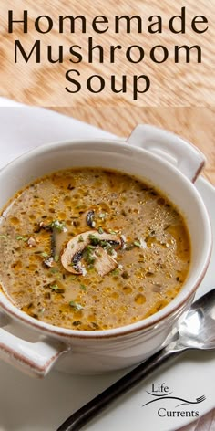 a white bowl filled with soup on top of a table