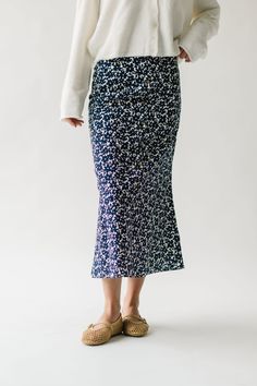 Discover playful sophistication with the Boyden Floral Midi Skirt. This navy skirt features a charming floral print, perfect for making a statement. Its midi length offers versatility for any occasion. Add a touch of whimsy to your wardrobe with this fun and stylish piece. Details self/lining: 65% cotton + 35% rayon Fabric Care Guide Here Sizing & Fit Measurements are approximate and taken while laying flat across the front. Not doubled. x-small: waist = 13"; length = 32" small: waist = 14"; len Floral Print Relaxed Fit Midi Skirt, Casual Midi-length Skirt With Floral Print, Relaxed Midi-length Rayon Skirt, A-line Floral Print Relaxed Skirt, Non-stretch Floral Print Midi Skirt, Piper And Scoot, Navy Skirt, Winter Maternity, Ruffle Sleeve Blouse