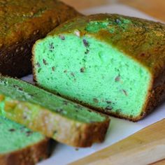 there is a loaf of green cake on the plate