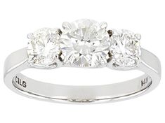 three stone diamond ring in white gold