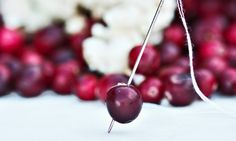 cherries and cotton candy are sitting on the table