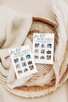 two magazine covers sitting on top of a basket next to a blanket and feather tail