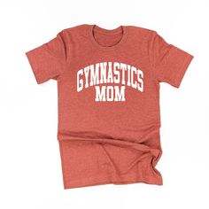 All Little Mama shirts are unisex sizing. They run slightly larger than typical women's shirts and slightly smaller than typical men's shirts. We recommend ordering your normal size for a regular fit.Please reference all size charts before purchasing.The default design color on this shirt is white, unless an option is given. Athleisure Cotton T-shirt With Team Name, Cotton Gym Tops With Text Print, Sporty Relaxed Fit Shirt For College, Casual Gym Shirt With Graphic Print, Graphic Print Cotton Workout Shirt, Unisex Pre-shrunk Sporty T-shirt, Sporty Unisex Pre-shrunk T-shirt, Basic Gym Tops With Letter Print, Sporty Gym Shirt With Letter Print