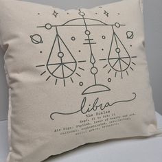 a pillow with the words libra on it