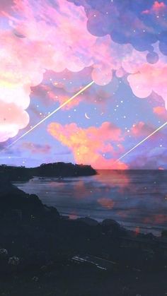 the sky is filled with colorful clouds and stars