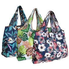 three floral shopping bags on white background