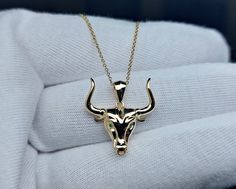 14k Gold Bull necklace, Taurus Pendant Set with Emeralds Eyes. Taurus is the bull of the zodiac, and it's glyph represents this magnificent creature. The bull is Strong, determined, focused and sometimes stubborn, the bull is a great symbol for Taurus This 14k Taurus Necklace is a beautiful gift for your love, friend or youself. Setting: Metal type: 14K solid gold Setting type: Bezel DETAILS: * 14k solid gold bull Necklace -Pendant height: 20.3mm (0.80Inch) - including the bail -Pendant width: 1 Bull Necklace, Taurus Pendant, Taurus Necklace, Emerald Eyes, Sapphire Band, The Bull, For Your Love, Diamond Rings Bands, Diamond Hoop Earrings