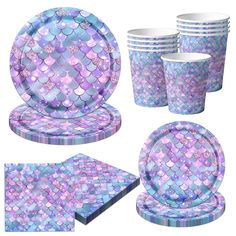 a purple and blue mermaid themed tableware set with matching plates, cups and napkins