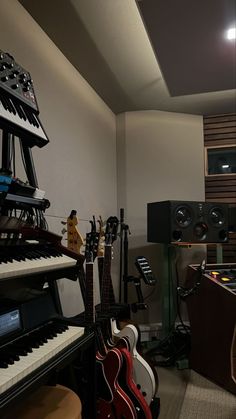 a room filled with musical instruments and sound equipment