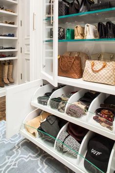 the closet is filled with many purses and shoes