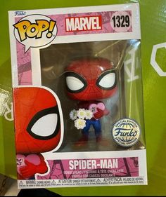 the spider - man pop vinyl figure is on display