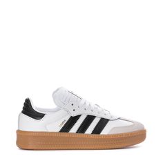 The Samba started as an indoor soccer trainer, but for over 70 years, it's been a staple off the field. The adidas Samba XLG youth shoes bring a fresh twist to the classic with an oversized design and a mix of leather and suede. The timeless colors keep the style effortlessly simple. Pair them with baggy jeans and a graphic tee for a casual day out or with wide-leg pants and your favorite bucket hat for a go-to look.Features: Classic lace closure. Woven "adidas SAMBA" tongue label. Printed "SAMB Adidas Low-top Basketball Shoes With Gum Sole, Platform Sambas, Adidas Samba Platform, Samba Shoes, Youth Shoes, Kicks Shoes, Adidas Shoes Women, Black Gums, Nike Fashion